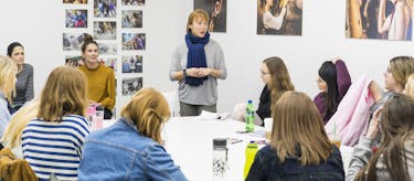 Tutor teaching a class
