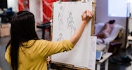 Student taking part in a life drawing session