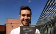 James Addison holding the book Have You Got Four Candles