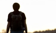 Man walking with a backpack