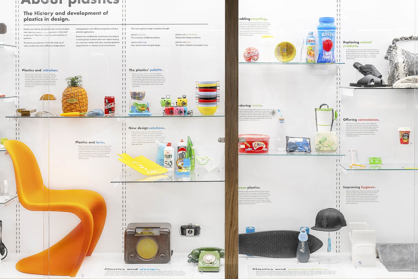 A glass cabinet displaying various plastic objects