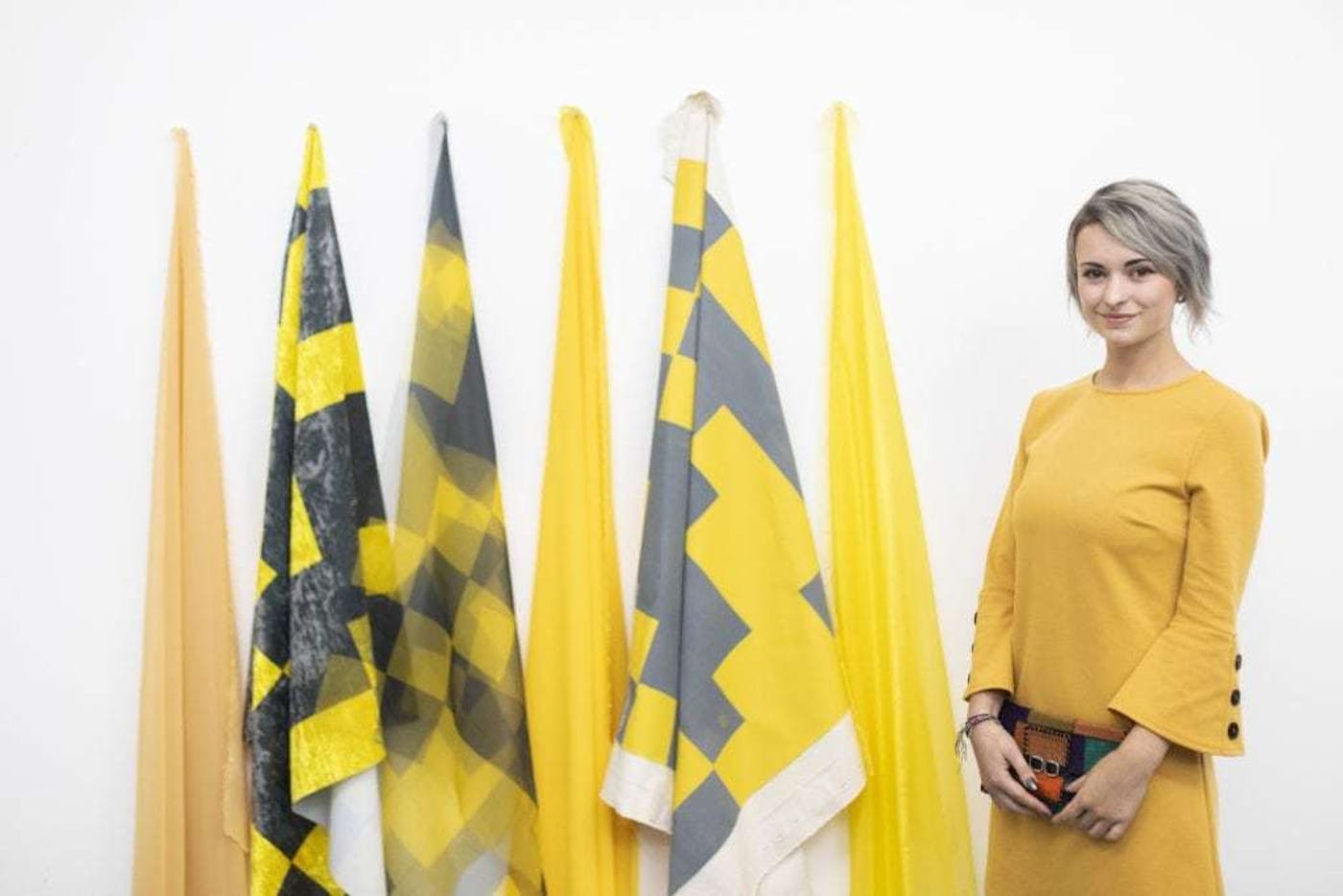 MA Fine Art graduate Alexx Haley with her work