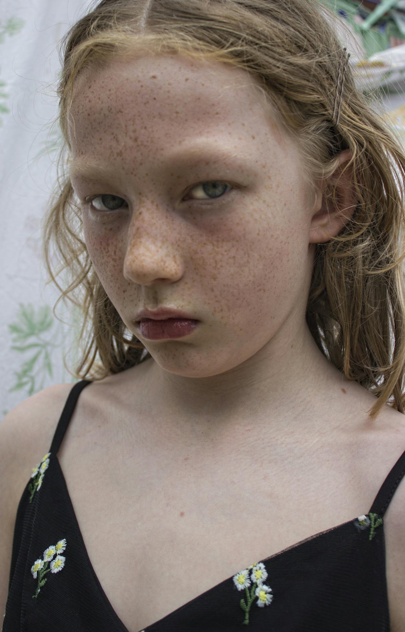 Girl with a disapproving expression
