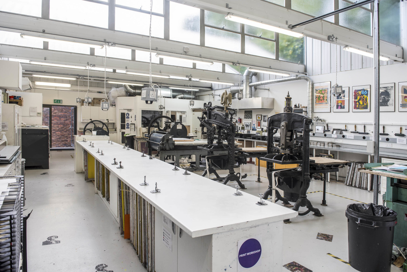 The printroom with three printing presses and Screen printing areas
