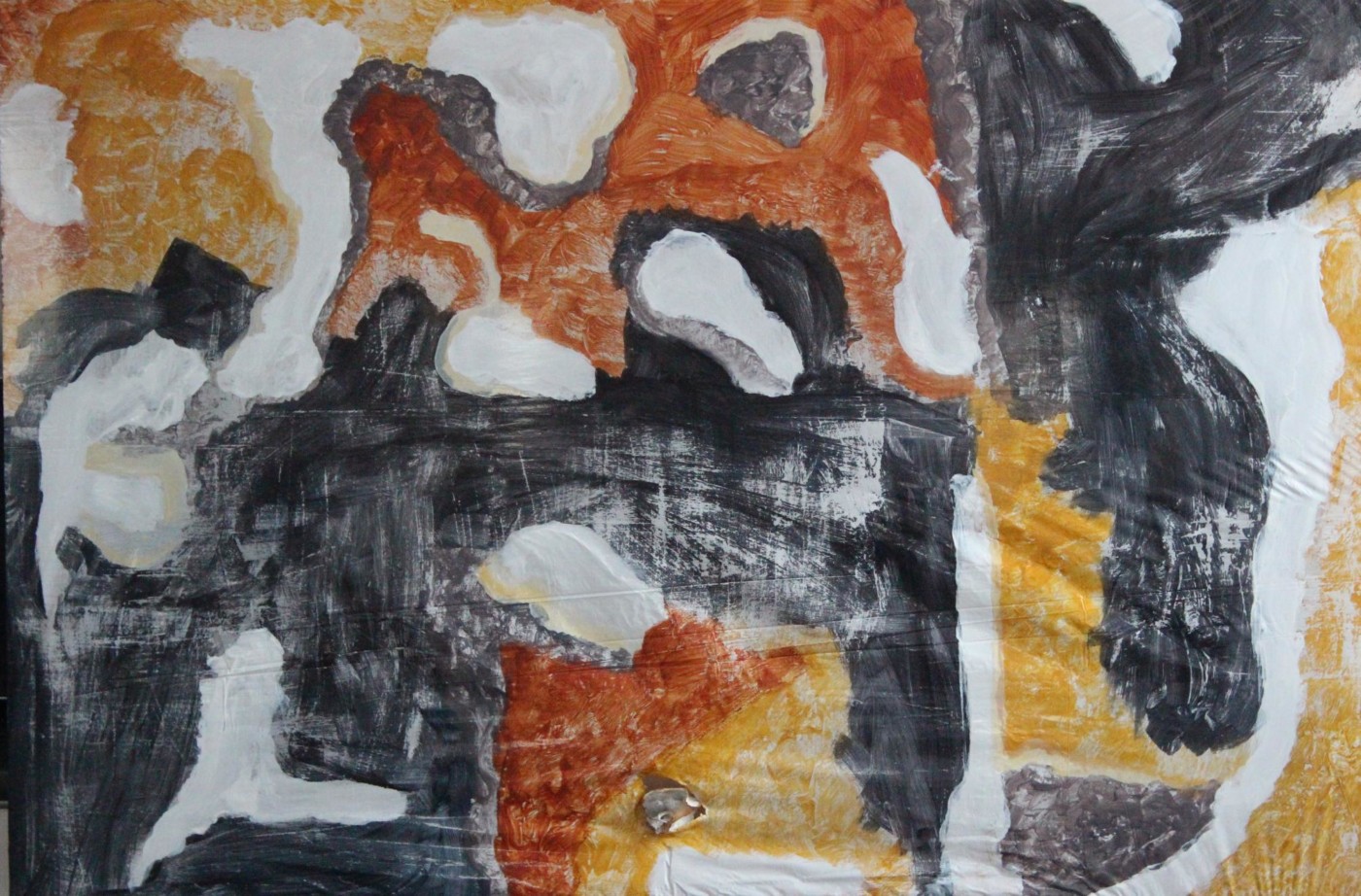 Abstract image of black, white, orange and yellow shapes