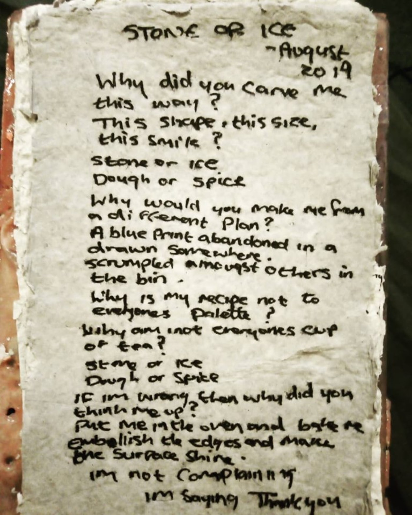 A poem written down on a crumpled piece of paper