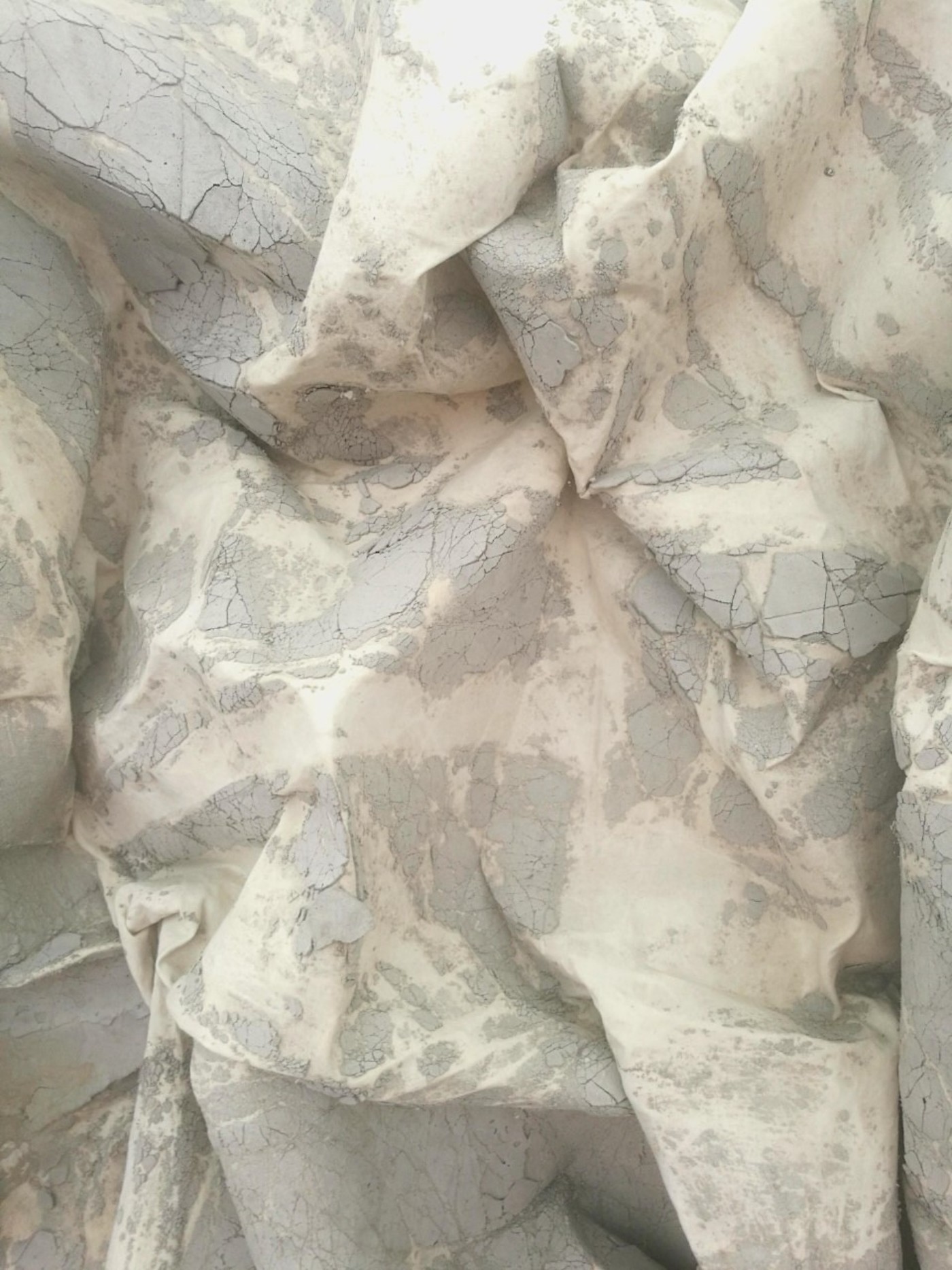 White wall with dried concrete