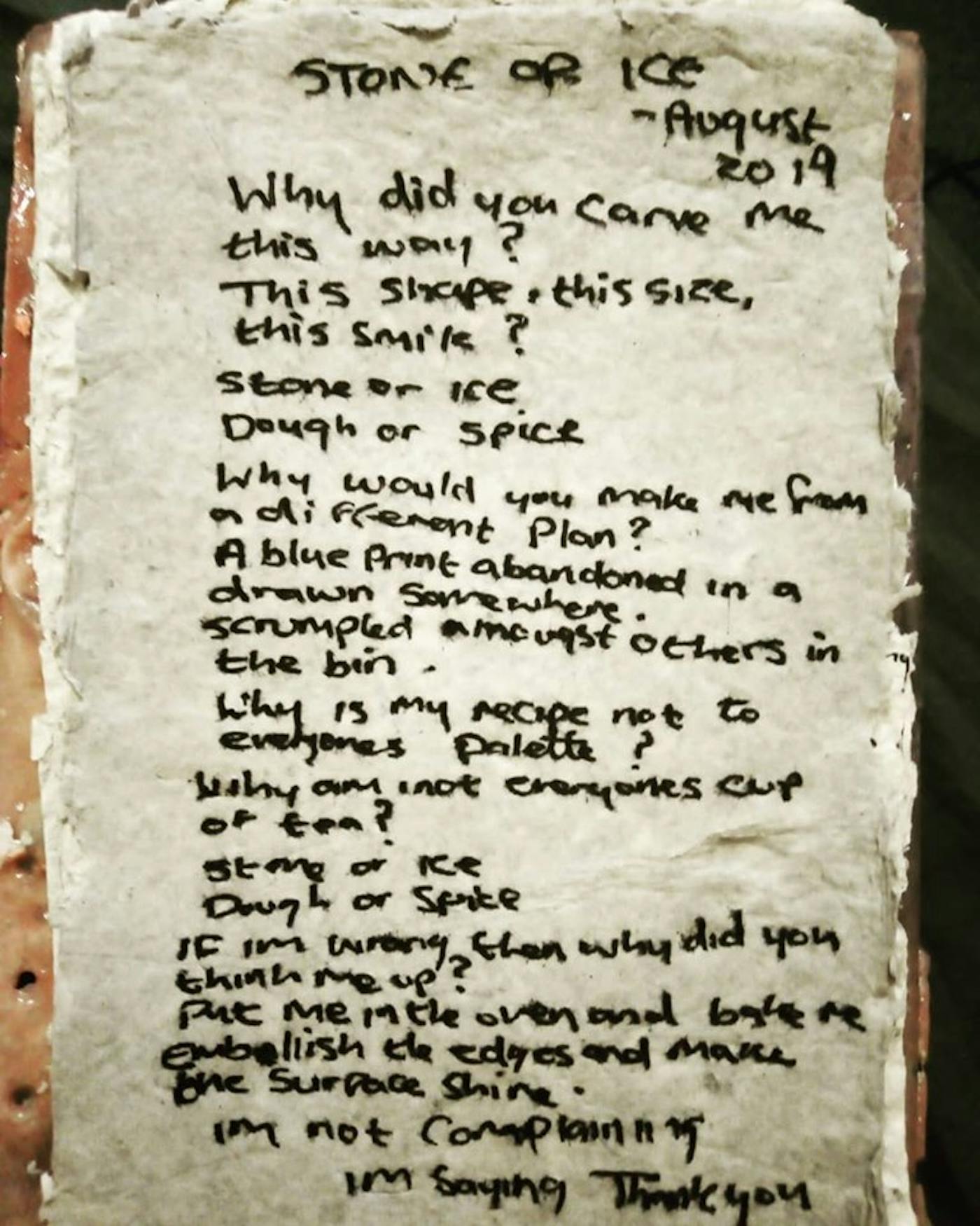 A poem written down on a crumpled piece of paper